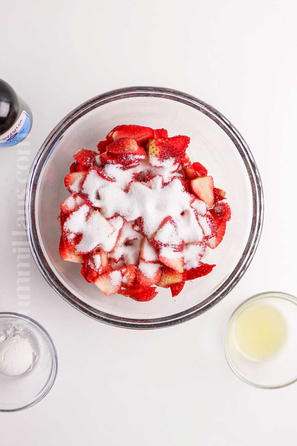 mascerating the strawberries