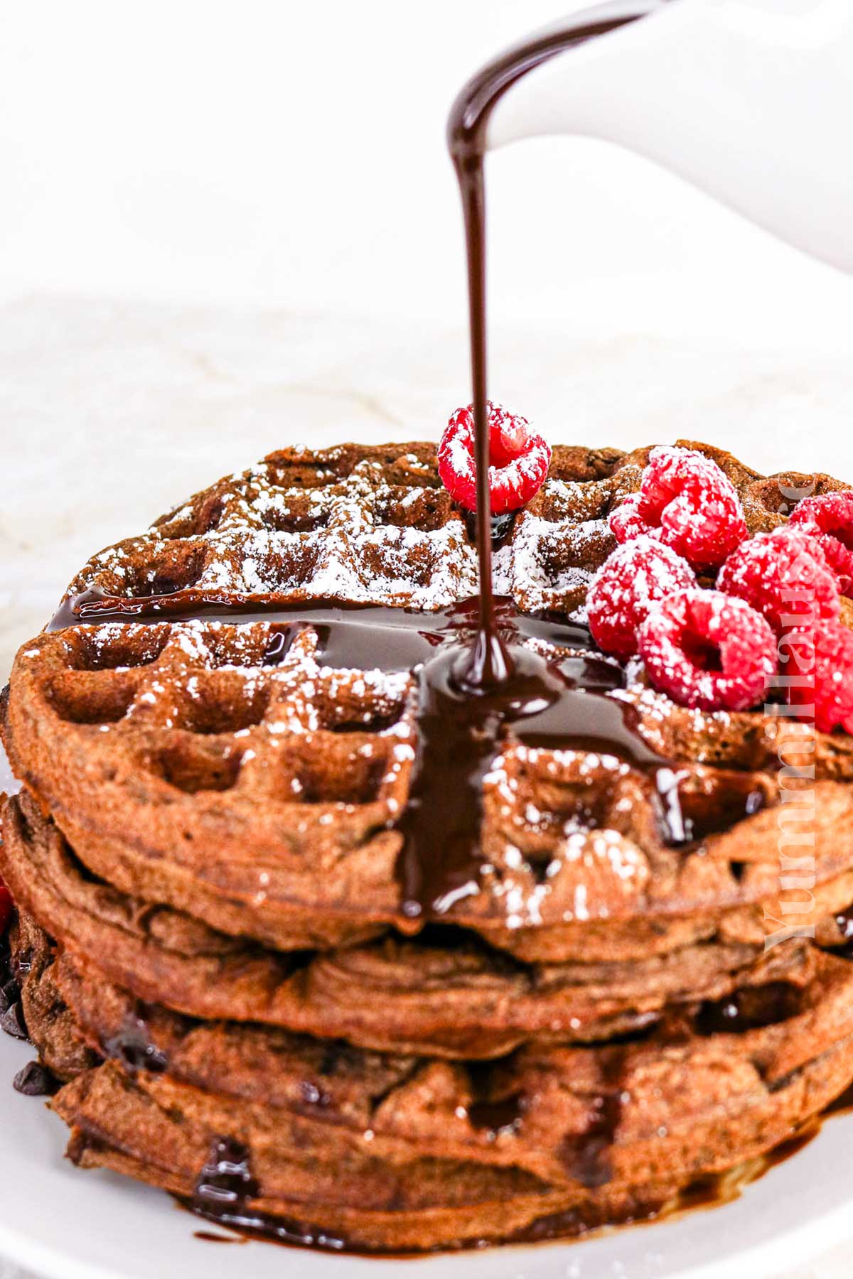 chocolate sauce on waffles